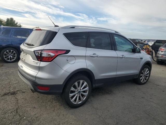 Photo 3 from auction – 2017 FORD ESCAPE with VIN 1FMCU9J99HUC92377