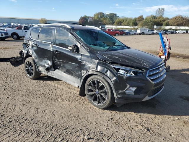 Photo 4 from auction – 2017 FORD ESCAPE TIT with VIN 1FMCU0J93HUB40641