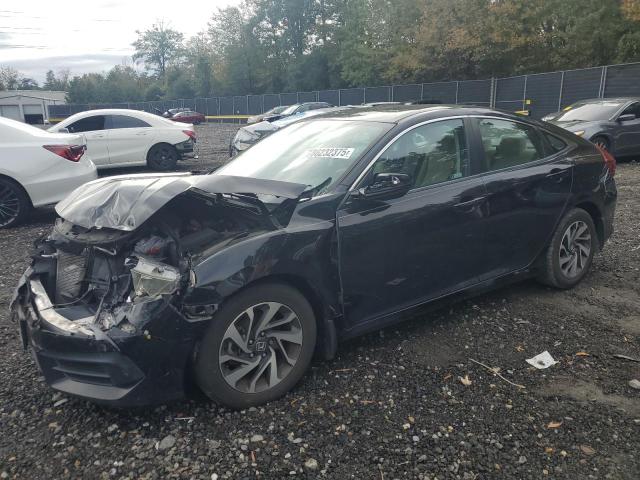 HONDA CIVIC EX 2018 with VIN 2HGFC2F76JH609870 - Photo from auction