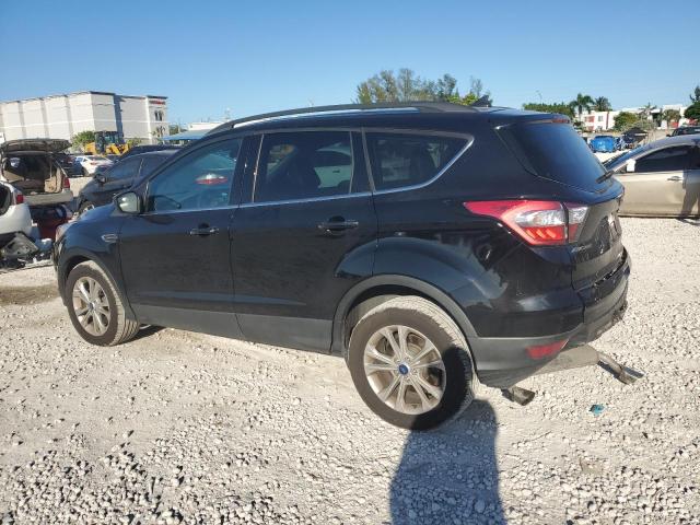 Photo 2 from auction – 2018 FORD ESCAPE with VIN 1FMCU9HD1JUC51581