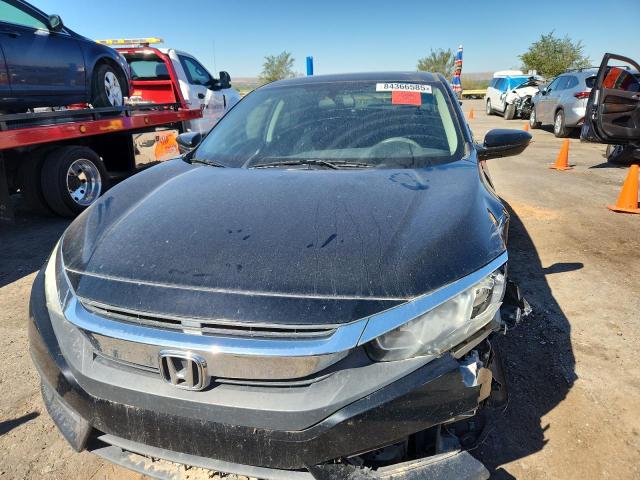 Photo 5 from auction – 2018 HONDA CIVIC EX with VIN 19XFC2F75JE039466