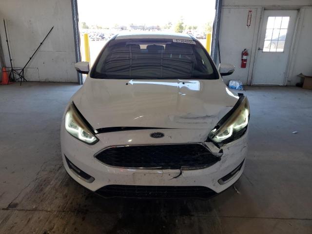 Photo 5 from auction – 2015 FORD FOCUS SE with VIN 1FADP3F29FL312953