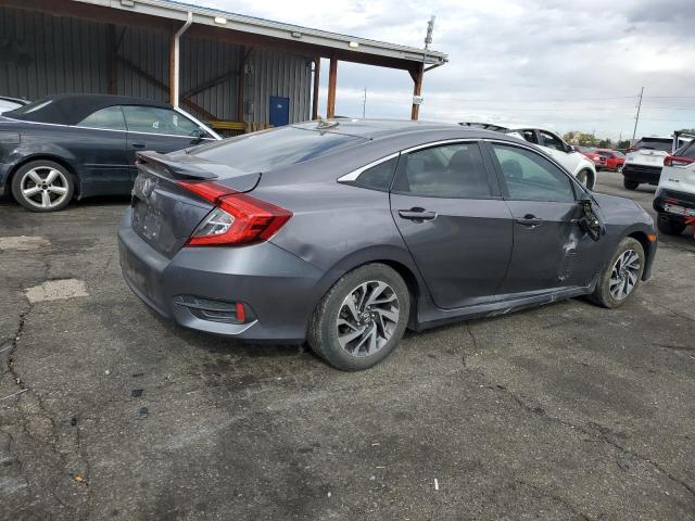 Photo 3 from auction – 2018 HONDA CIVIC EX with VIN 19XFC2F87JE015503