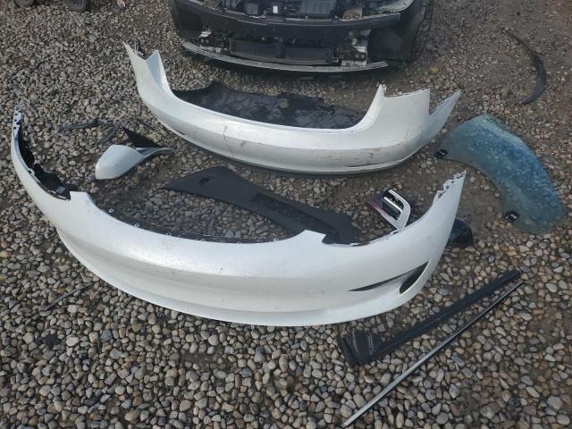 Photo 12 from auction – 2018 TESLA MODEL 3 with VIN 5YJ3E1EB7JF084237