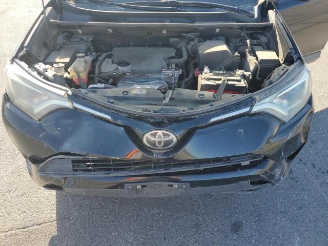Photo 12 from auction – 2018 TOYOTA RAV4 LE with VIN 2T3ZFREV0JW493531