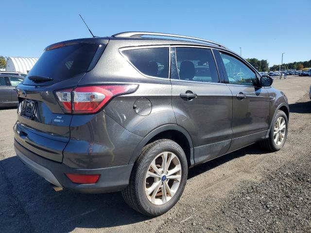 Photo 3 from auction – 2018 FORD ESCAPE SE with VIN 1FMCU9GD3JUB92244