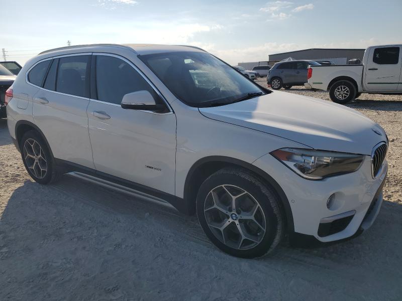 Photo 4 from auction – 2017 BMW X1 XDRIVE2 with VIN WBXHT3C38H5F75016