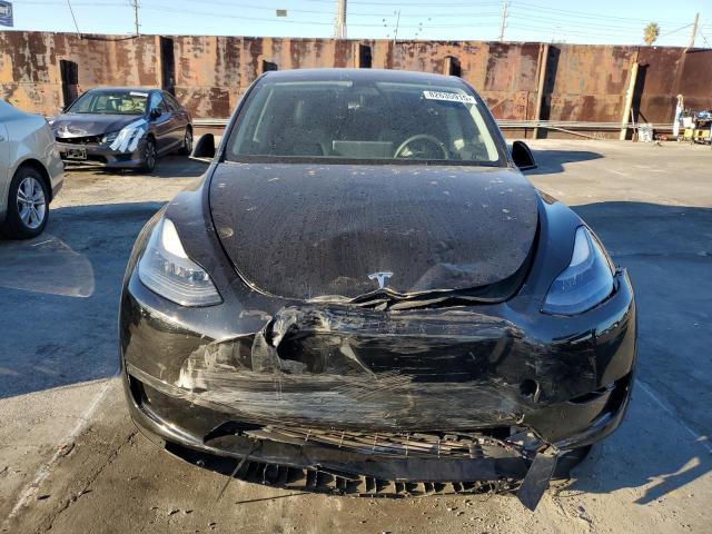 Photo 5 from auction – 2023 TESLA MODEL Y with VIN 7SAYGDEF1PF665085