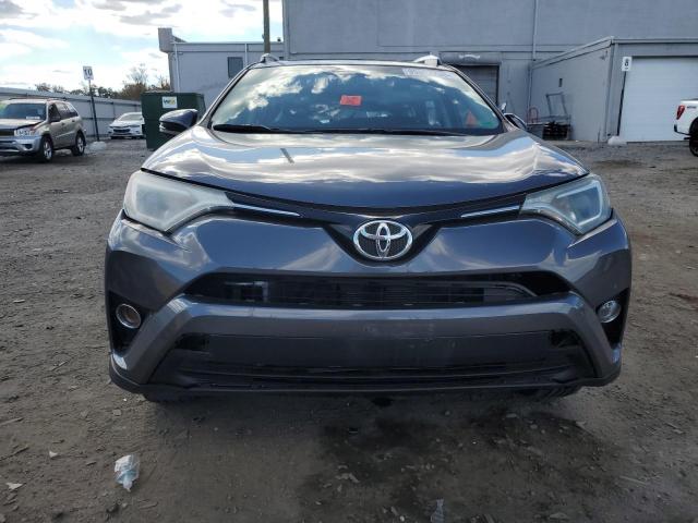 Photo 5 from auction – 2016 TOYOTA RAV4 XLE with VIN 2T3RFREV2GW528515