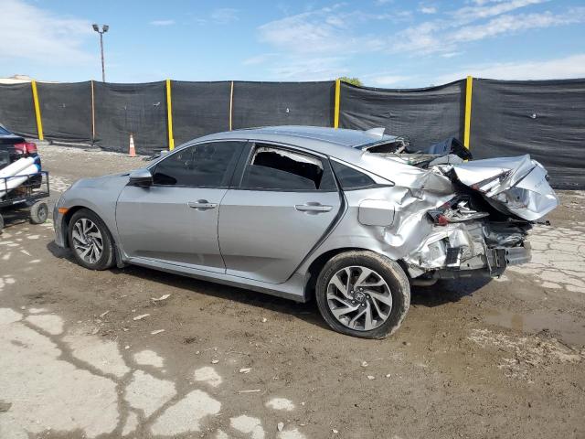 Photo 2 from auction – 2018 HONDA CIVIC EX with VIN 19XFC2F85JE004788