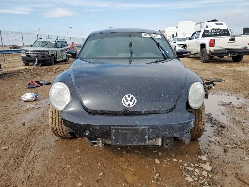 Photo 5 from auction – 2014 VOLKSWAGEN BEETLE TUR with VIN 3VWVS7AT2EM615023