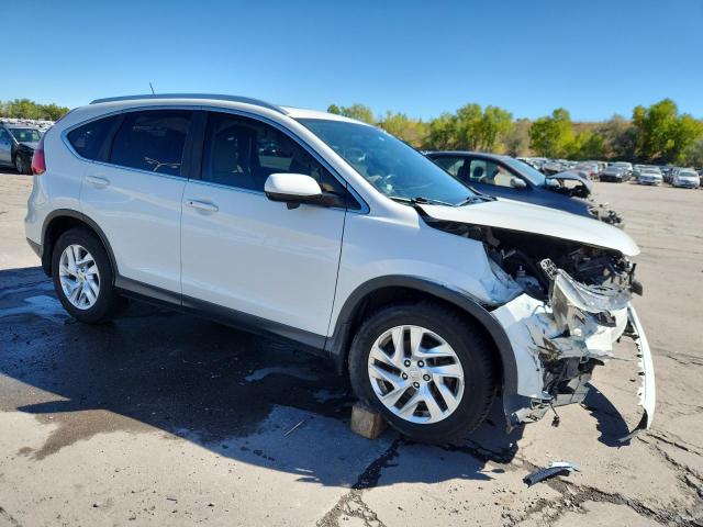 Photo 4 from auction – 2015 HONDA CR-V EXL with VIN 5J6RM4H77FL025886