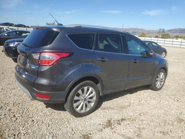 Photo 3 from auction – 2017 FORD ESCAPE with VIN 1FMCU9J90HUC98973