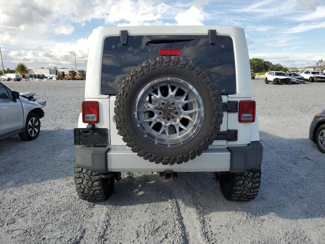Photo 6 from auction – 2012 JEEP WRANGLER U with VIN 1C4BJWEG5CL176205