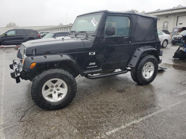JEEP WRANGLER C 2003 with VIN 1J4FA39S63P320572 - Photo from auction