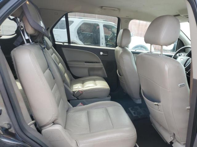 Photo 11 from auction – 2009 FORD TAURUS X with VIN 1FMDK02W29GA03382