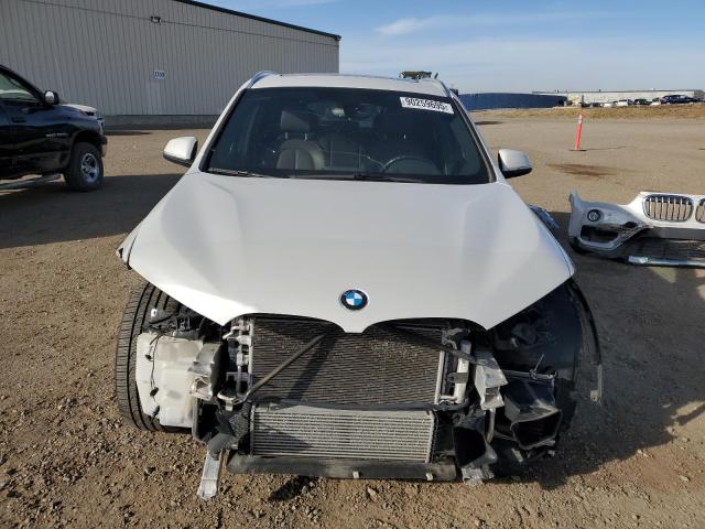 Photo 5 from auction – 2016 BMW X1 XDRIVE2 with VIN WBXHT3C30G5E56679
