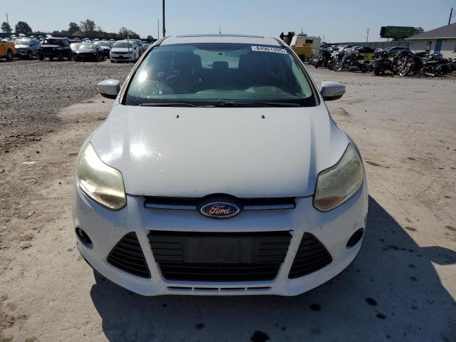 Foto 5 de la subasta – 2014 FORD FOCUS SE con VIN 1FADP3K28EL157753