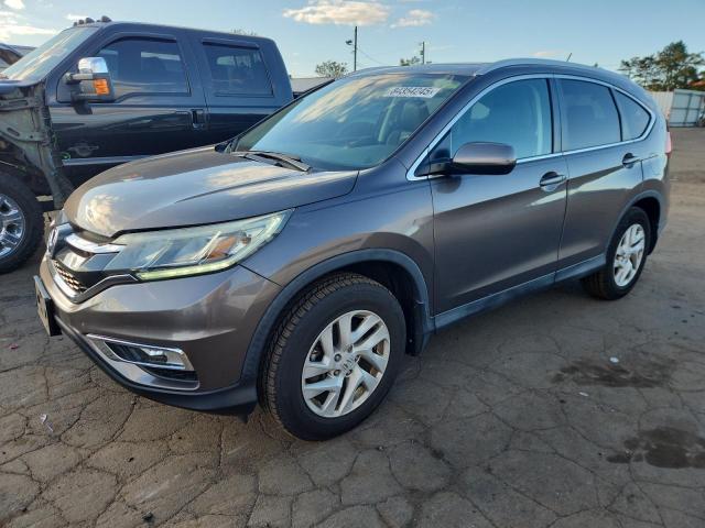 HONDA CR-V EXL 2015 with VIN 2HKRM4H77FH706639 - Photo from auction
