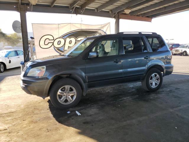 HONDA PILOT EXL 2003 with VIN 2HKYF18543H615147 - Photo from auction