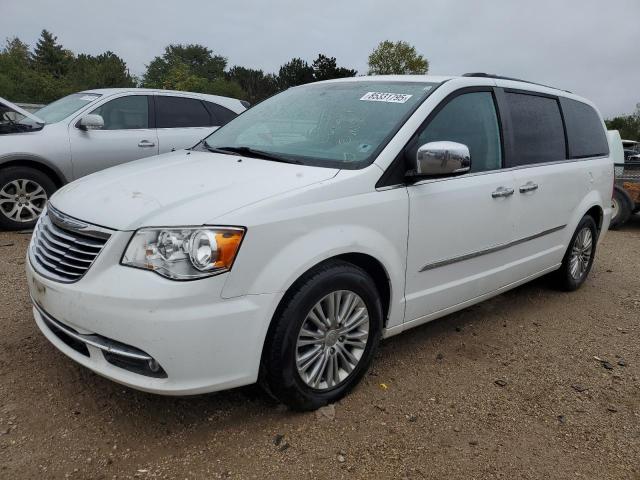 CHRYSLER TOWN & COU 2016 with VIN 2C4RC1CGXGR121034 - Photo from auction