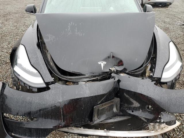 Photo 11 from auction – 2020 TESLA MODEL 3 with VIN 5YJ3E1EA3LF657631