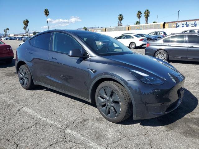 Photo 4 from auction – 2025 TESLA MODEL Y with VIN 7SAYGDED6SF243952