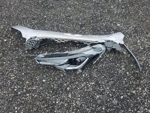 Photo 12 from auction – 2023 GENESIS G70 BASE with VIN KMTG34TA4PU127033