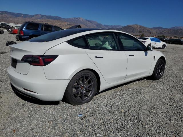 Photo 3 from auction – 2021 TESLA MODEL 3 with VIN 5YJ3E1EA8MF028206