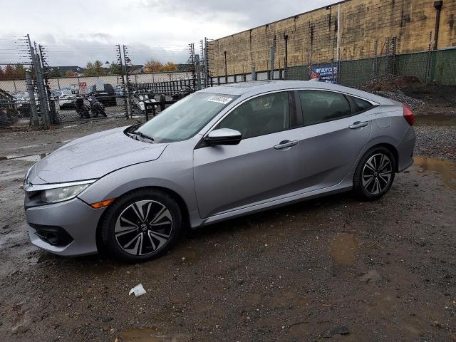 HONDA CIVIC EXL 2018 with VIN JHMFC1F74JX043775 - Photo from auction