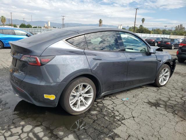 Photo 3 from auction – 2022 TESLA MODEL Y with VIN 7SAYGAEEXNF402192