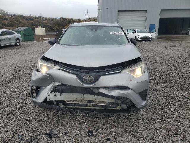 Photo 5 from auction – 2018 TOYOTA RAV4 LE with VIN 2T3BFREV6JW739368