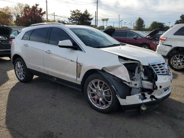 Photo 4 from auction – 2014 CADILLAC SRX PREMIU with VIN 3GYFNGE32ES658467