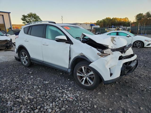 Photo 4 from auction – 2016 TOYOTA RAV4 XLE with VIN 2T3RFREV1GW448333