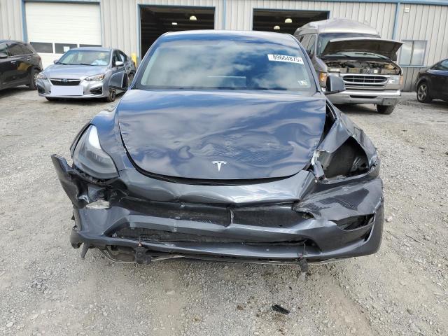 Photo 5 from auction – 2022 TESLA MODEL Y with VIN 7SAYGDEF4NF461619