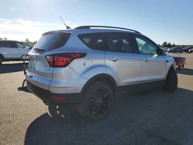 Photo 3 from auction – 2019 FORD ESCAPE SE with VIN 1FMCU9GD8KUB28055