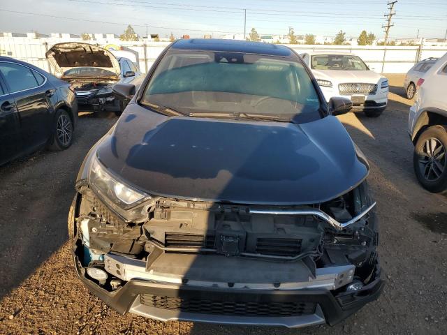 Photo 5 from auction – 2018 HONDA CR-V EX with VIN 7FARW2H52JE068356
