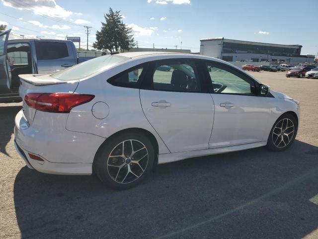 Photo 3 from auction – 2015 FORD FOCUS SE with VIN 1FADP3F24FL355595