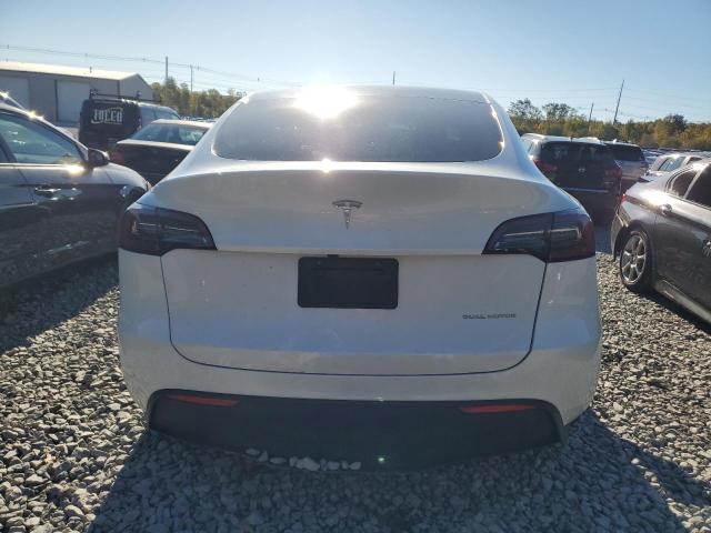 Photo 6 from auction – 2023 TESLA MODEL Y with VIN 7SAYGDEE1PF883051