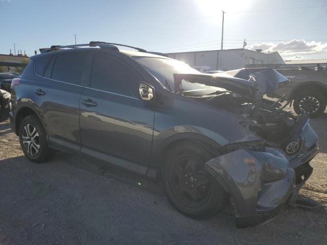 Photo 4 from auction – 2018 TOYOTA RAV4 LE with VIN 2T3ZFREV8JW452497