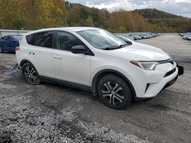Photo 4 from auction – 2018 TOYOTA RAV4 LE with VIN JTMBFREV4JJ206983