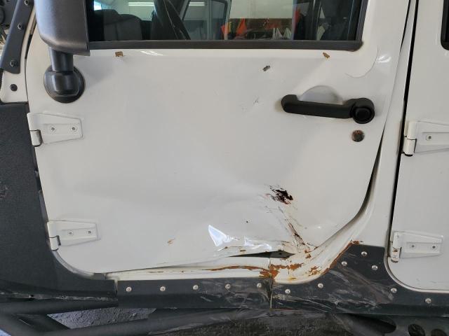 Photo 7 from auction – 2014 JEEP WRANGLER U with VIN 1C4BJWDG1EL115812