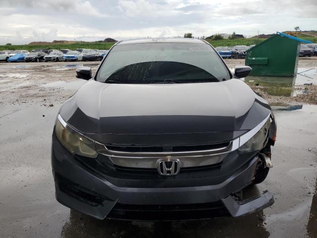 Photo 5 from auction – 2018 HONDA CIVIC EX with VIN 19XFC2F73JE032225