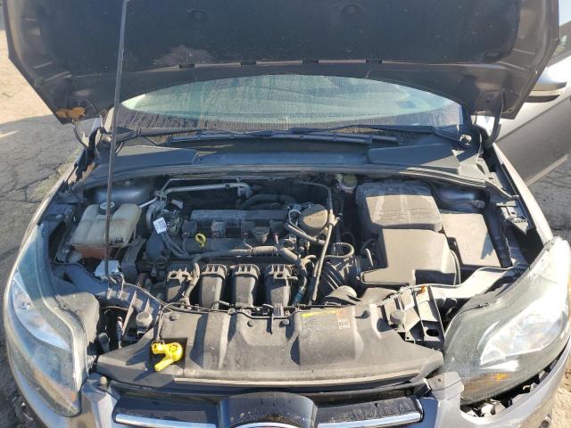 Photo 11 from auction – 2013 FORD FOCUS TITA with VIN 1FADP3J24DL120909