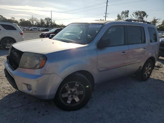 Photo 1 from auction – 2010 HONDA PILOT TOUR with VIN 5FNYF4H87AB003161
