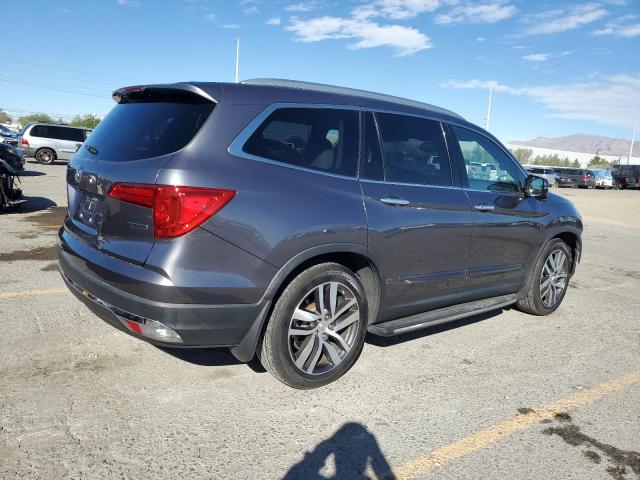 Photo 3 from auction – 2017 HONDA PILOT TOUR with VIN 5FNYF5H96HB003659