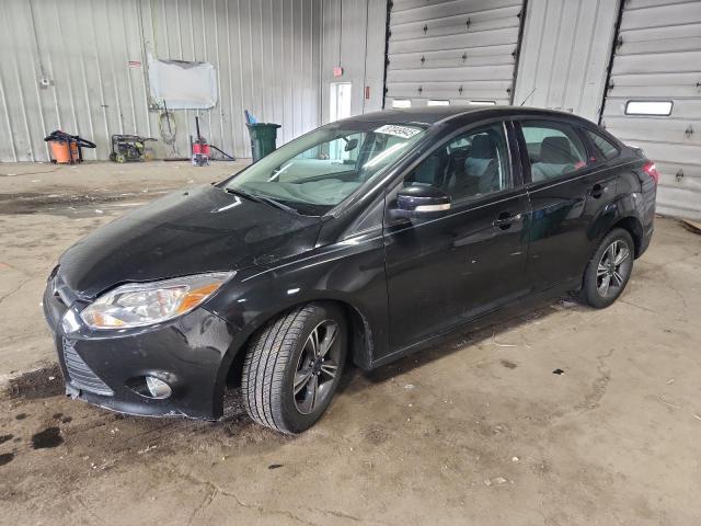 FORD FOCUS SE 2014 with VIN 1FADP3F21EL379500 - Photo from auction