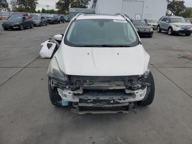 Photo 5 from auction – 2015 FORD ESCAPE TIT with VIN 1FMCU0J95FUA41557