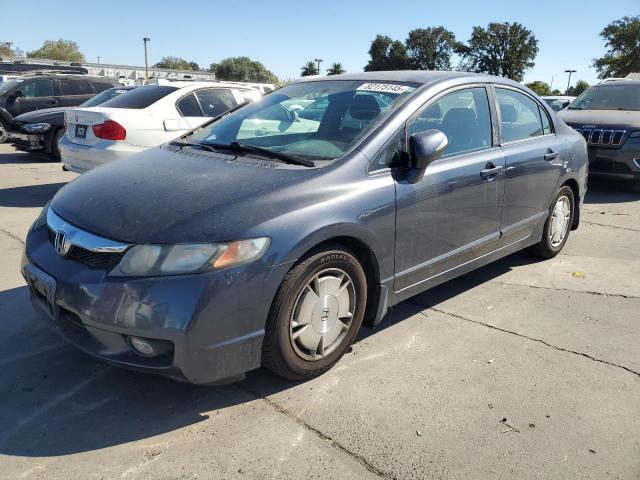 HONDA CIVIC HYBR 2009 with VIN JHMFA362X9S012884 - Photo from auction
