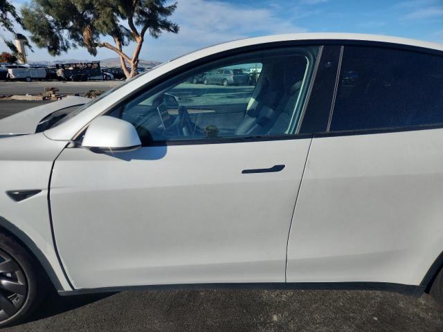 Photo 7 from auction – 2023 TESLA MODEL Y with VIN 7SAYGDEE9PF585900